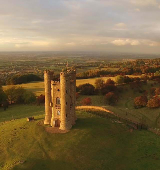 Aerial image of the Broadway Tower at sunset