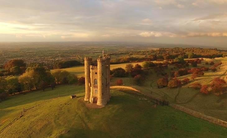 Aerial image of the Broadway Tower at sunset