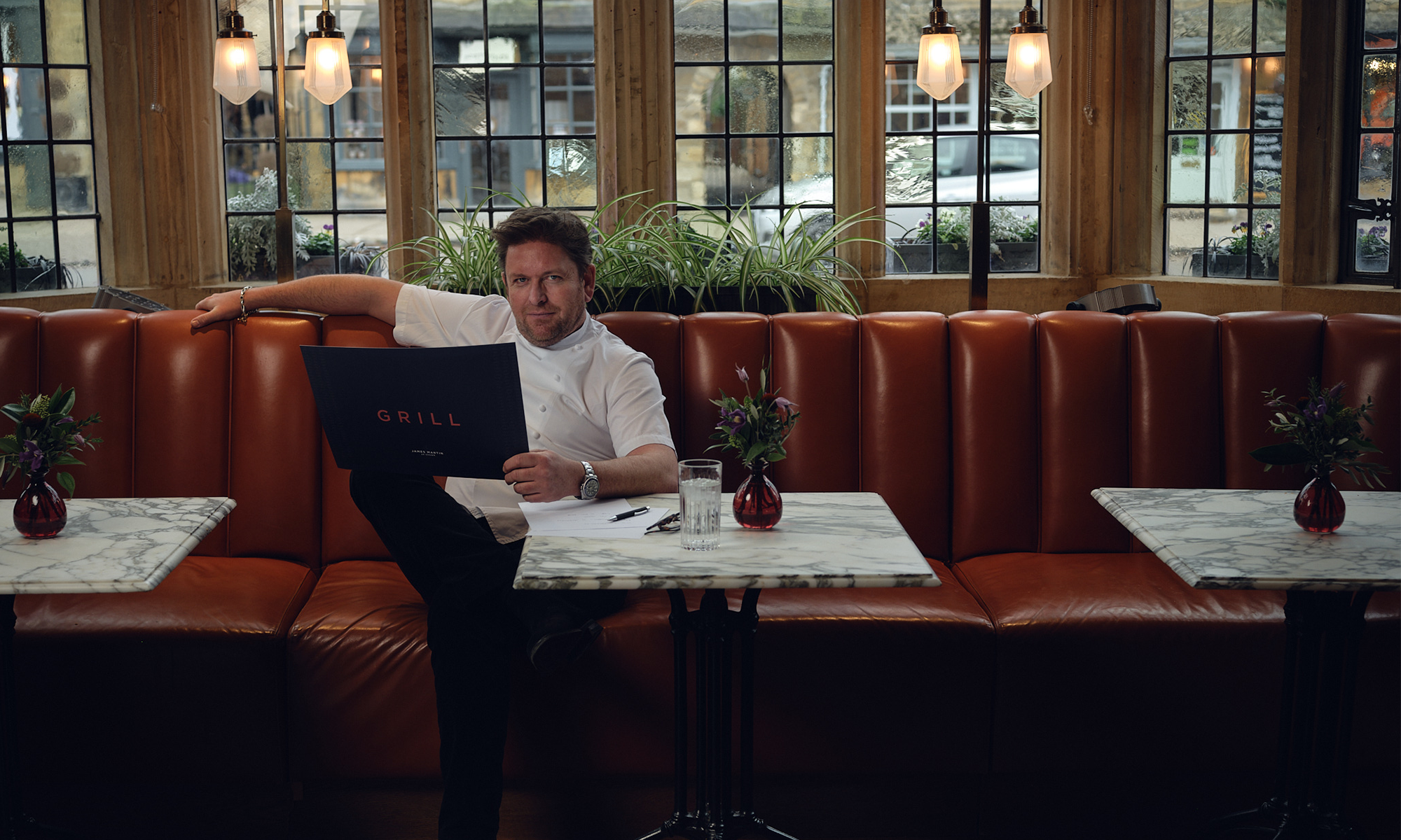 James Martin sitting down at the Grill restaurant at The Lygon Arms
