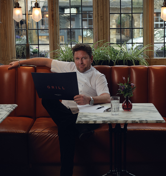 James Martin sitting down at the Grill restaurant at The Lygon Arms
