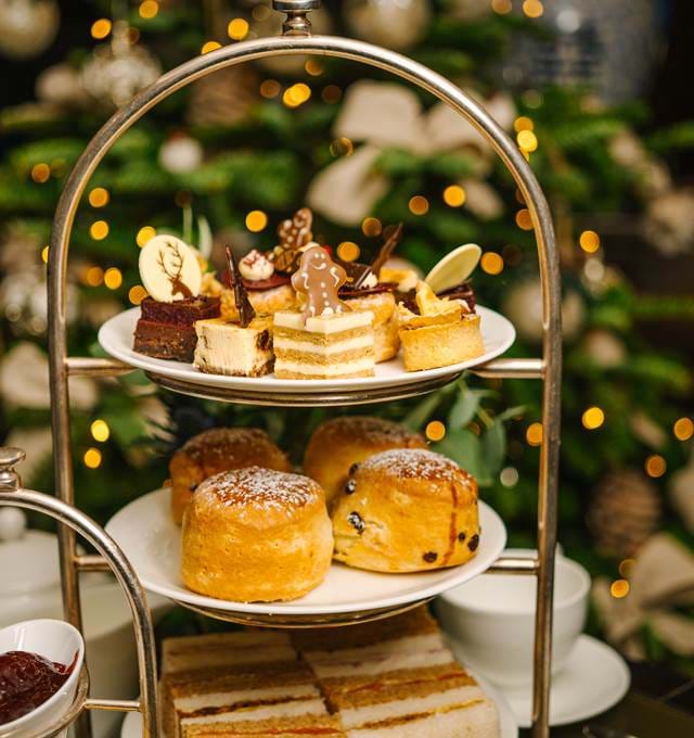 Three layer of afternoon tea, scones, and seasonal treats