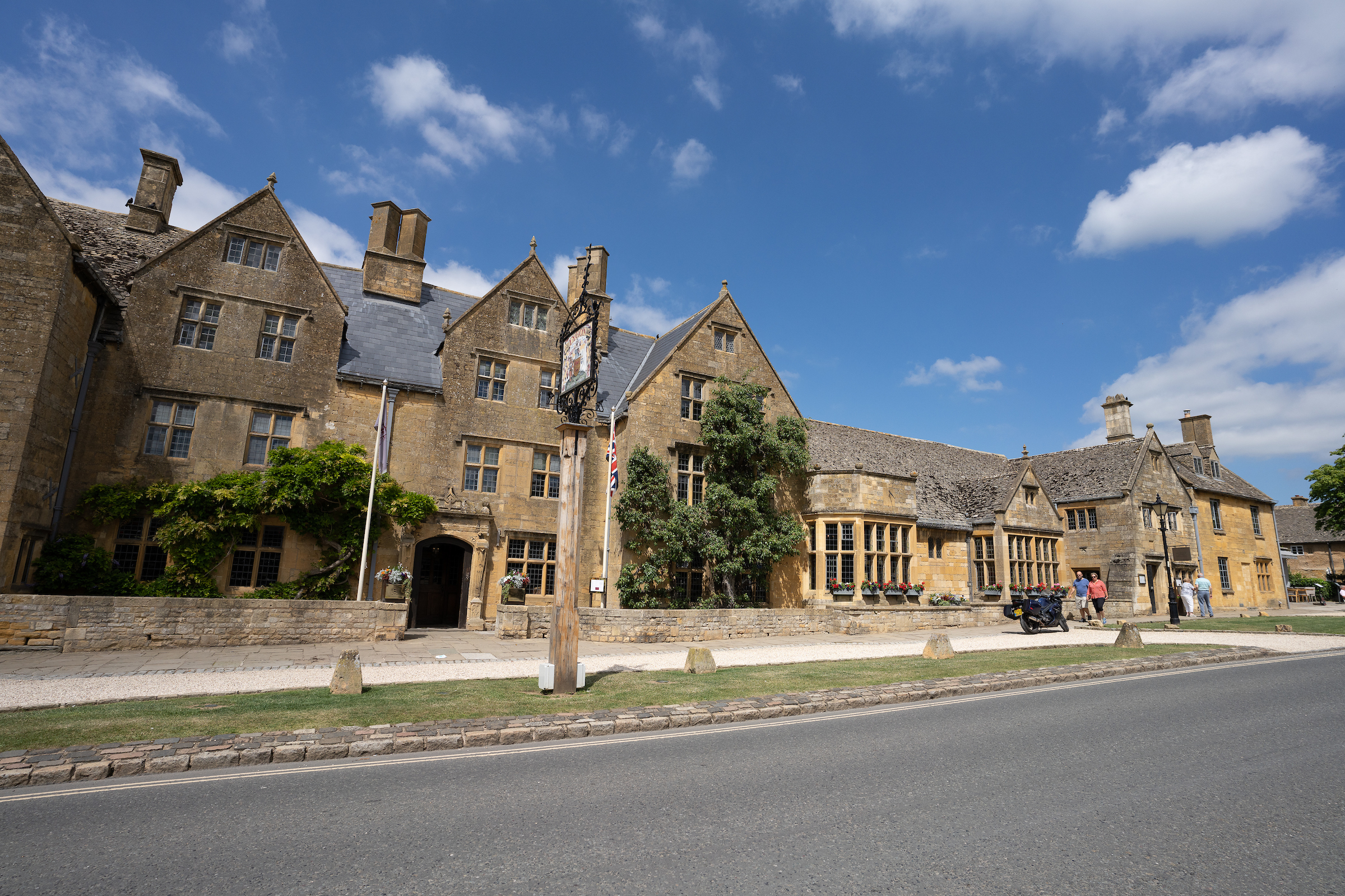 The Lygon Arms facade with blue skies