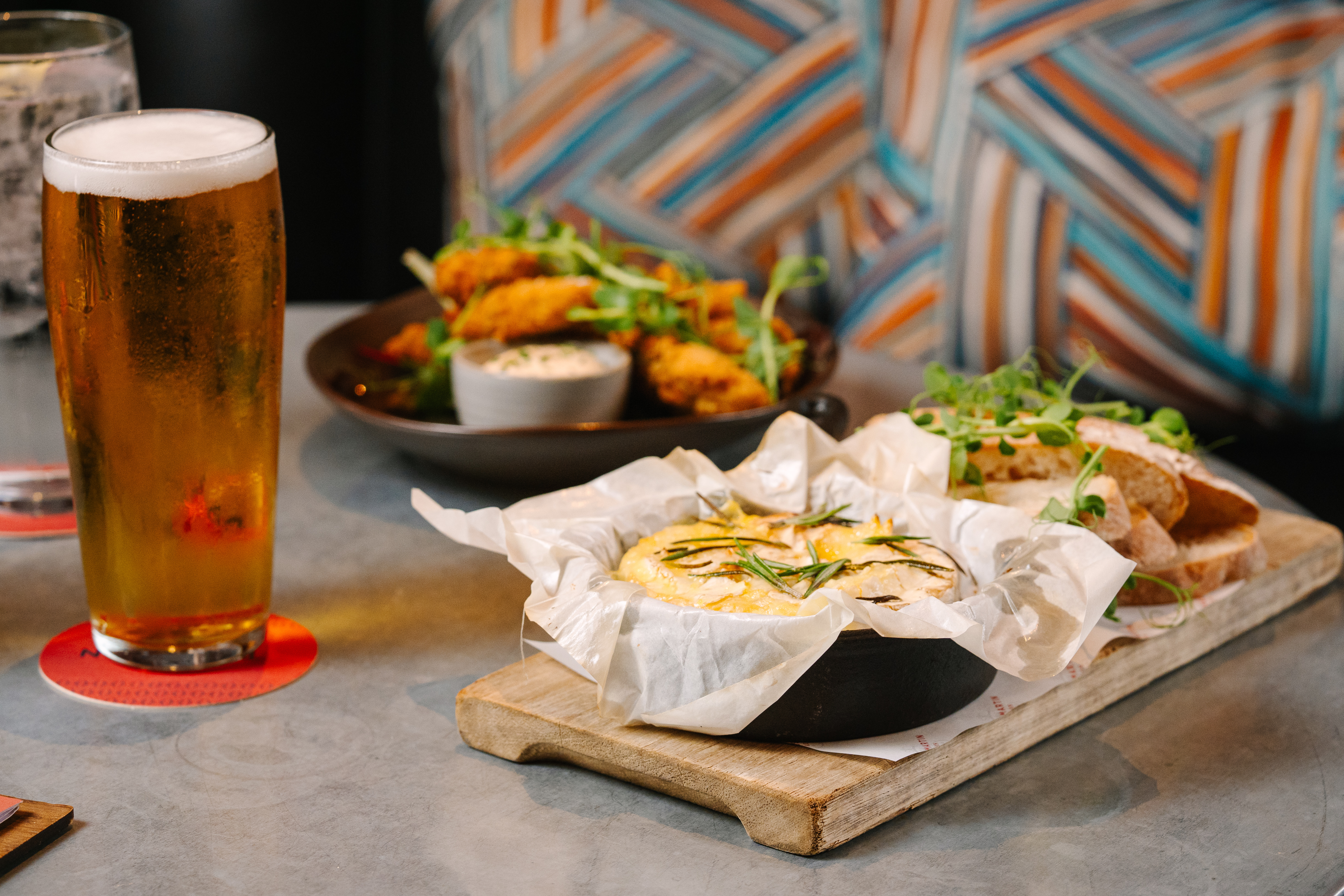 Food and drink options at the Tavern restaurant, showcasing beer and small plates