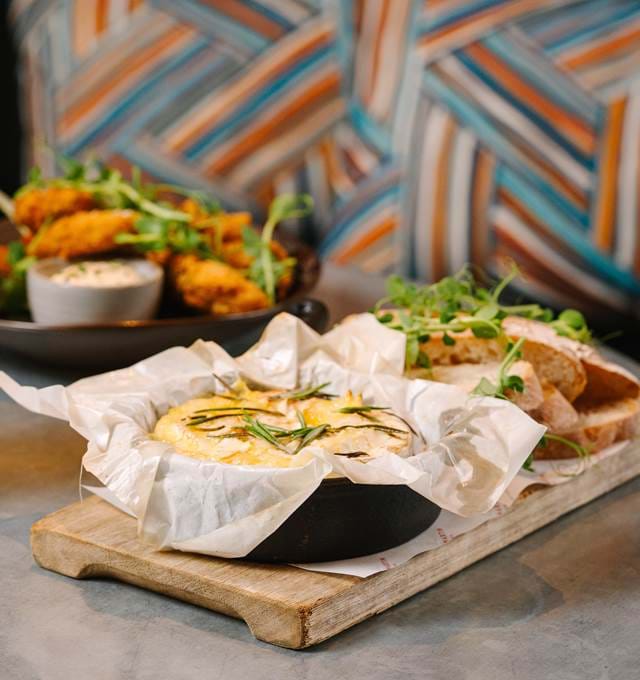 Food and drink options at the Tavern restaurant, showcasing beer and small plates