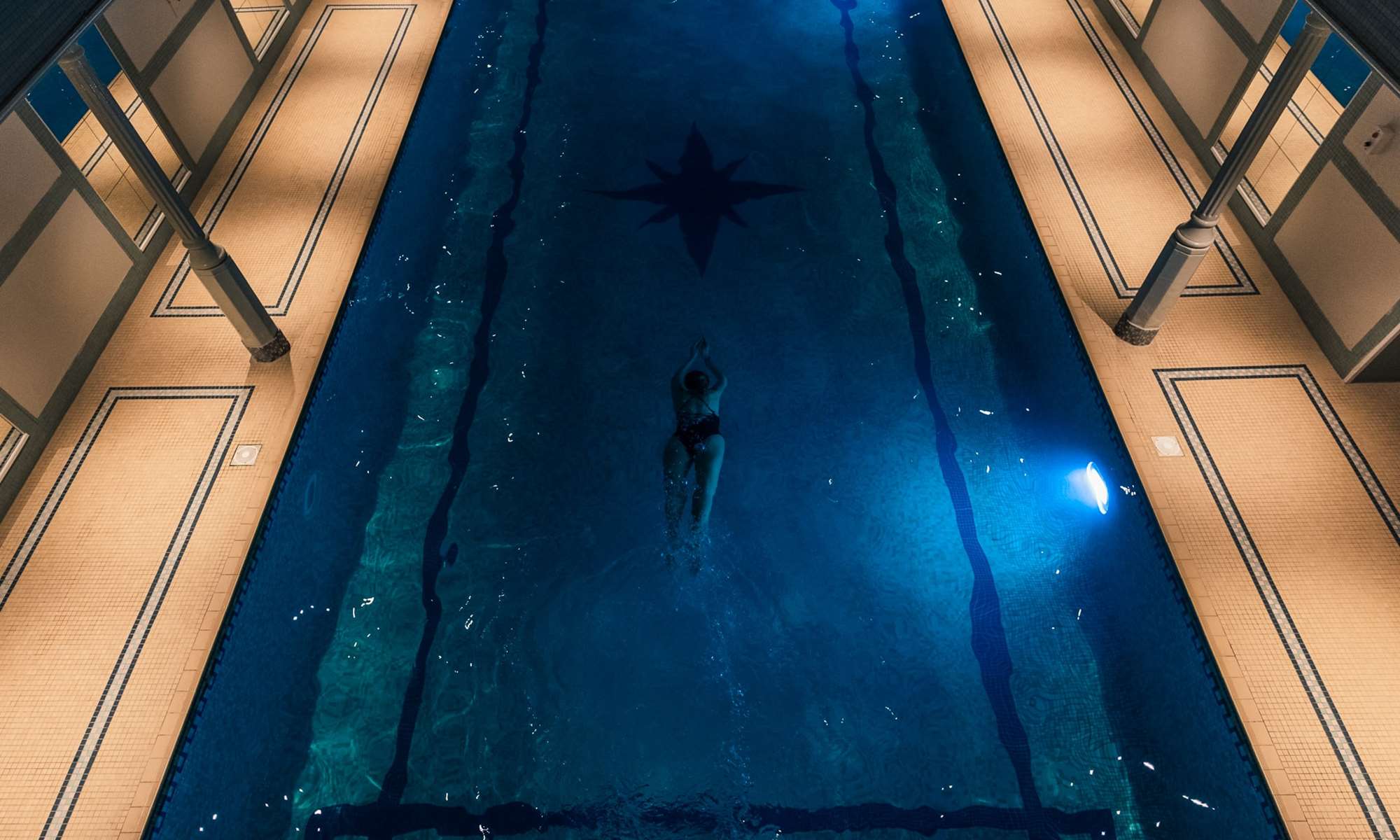 Woman Swimming In Lygon Arms Swimming Pool